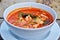 Thai cuisine name Tom yum goong is prawn and lemon grass soup with mushrooms