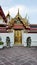 Thai door art architecture of Wat Phra Chetupon Vimolmangklararm (Wat Pho) temple in Thailand.