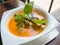 Thai duck curry soup in white bowl,