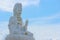 Thai famous big white bodhisattva guanyin statue with copy space sky background at Wat Huai Pla Kung temple, Chiang rai.