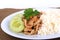 Thai Favorite Dish, Fried sliced pork with garlic with rice and cucumber