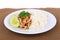 Thai Favorite Dish, Fried sliced pork with garlic with rice and cucumber