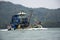 Thai fisher people sailing fishing boat ship in sea after catch fish and marine life in ocean of Phetra National Park to