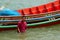 A Thai fisherman stands in water by his boat Pattani Thailand