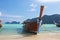 Thai fishing boats on the azure sea on the bounty beach in thailand