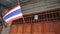 Thai flag hanging above door home