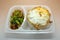 Thai food box, Fried egg over rice with stir fried chicken and vegetable