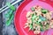Thai food menu, fried chicken, chili, herbs, lemongrass, kaffir lime leaves in a vintage wooden background plate