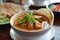 Thai food panang curry served with crispy roti