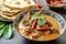 Thai food panang curry served with crispy roti