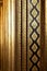 Thai golden pattern on black pillars in Thai temple abstract style