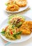 Thai green curry spaghetti with fried chicken.