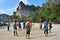 Thai guide people sailing wooden long tail boat send receive travelers and stop cruise rest for playing kick volleyball takraw on