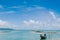 Thai Longtail Fishing Boat at Koh Tean near Samui island in summer day with blue sky