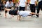Thai Male Breakdancers One Handed Plank