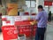 Thai Man in the Post Office, packet on the packing service area.