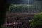 Thai mourners hold candles and pray for the late King Bhumibol A