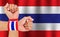 Thai national color cloth wristband on the guy`s wrist on waving national Thailand flag background