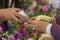 Thai New Year - young peoples pouring water and flowers on the hands of senior in Songkran ceremony