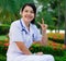 Thai nurse smiling with stethoscope