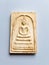 Thai old buddha amulet on background