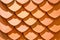 Thai old style rooftop pattern design, fish scales pattern, layer of red clay tiles roof texture background