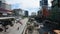 Thai people drive and ride on traffic road with construction site at Bangkok