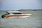 Thai people driving speed boat floating in the sea at Ban Pae beach in Rayong, Thailand