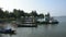 Thai people moored boat and ship at harbour of Tha Chana canal after fishing