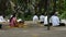 Thai people observe religious or practice dharma and meditate at Wat Sangkhatan in Nonthaburi, Thailand