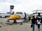 Thai people passengers walking go up airplane twin propeller