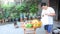 Thai people prepare and putting Sacrificial offering food on wooden table for pray to god