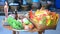 Thai people prepare and putting Sacrificial offering food on wooden table for pray to god