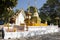 Thai people travel visit and respect praying chedi and Buddha`s relics at Wat Phra That Doi Tung in Chiang Rai, Thailand