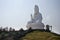 Thai people travelers visit and respect praying Buddha and Guan yin statues at Wat Huay Pla Kang Temple in Chiang Rai, Thailand