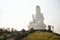 Thai people travelers visit and respect praying Buddha and Guan yin statues at Wat Huay Pla Kang Temple in Chiang Rai, Thailand