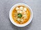 thai rice noodle in laksa soup with shredded chicken and fish ball served in bowl isolated on grey background top view of hong