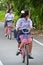 Thai Schoolgirl riding a bicycle