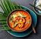 THAI SHRIMPS RED CURRY. Thailand Thai tradition red curry soup with shrimps prawns and coconut milk. Panaeng Curry in