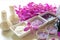 Thai Spa Treatments aroma therapy salt and sugar scrub and rock massage with orchid flower on wooden white. Healthy Concept.