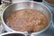 Thai spicy shrimp paste sauce in a stainless bowl for sell at Bang Lampu market, Bangkok, Thailand