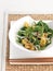 Thai spinach salad with clementine and white onion