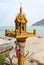 Thai spirit house in front of sea landscape