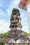 Thai Stucco pattern on the ancient pagoda or Prang Side view with blue sky