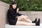 Thai student teen beautiful girl Black Dresses relax in park