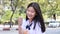 Thai student teen beautiful girl give drinking water