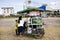 Thai students boy and girl buy food from local vendor cart and sidecar in Straw puppets Festival at Mahasarakham in Maha Sarakham