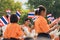 Thai students participating the ceremony of 100th aniversary of current Thai`s national flag.