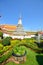 Thai stupa on the background of a Buddhist temple who drowned in the green landscape design