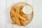 Thai style Chinese crullers in wooden plate with a glass of soy milk.